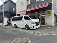 }[NX